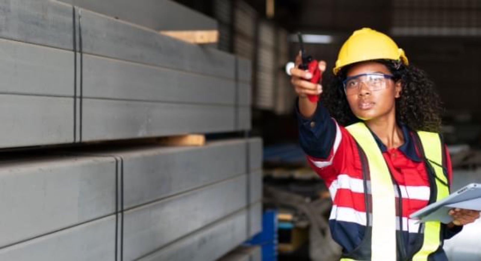 Inspector checking steel stock at a supplier warehouse during a vendor inspection